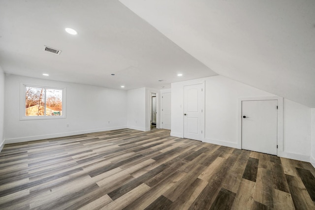 bonus room with baseboards, visible vents, recessed lighting, and wood finished floors