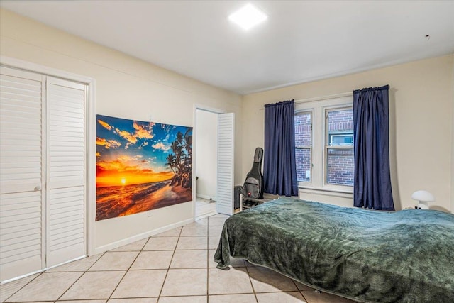 61-27 160th St, Fresh Meadows, NY 11365 - bedroom featuring light tile patterned floors and baseboards