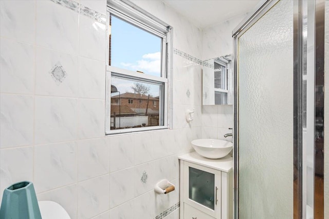 61-27 160th St, Fresh Meadows, NY 11365 - bathroom featuring vanity and tile walls