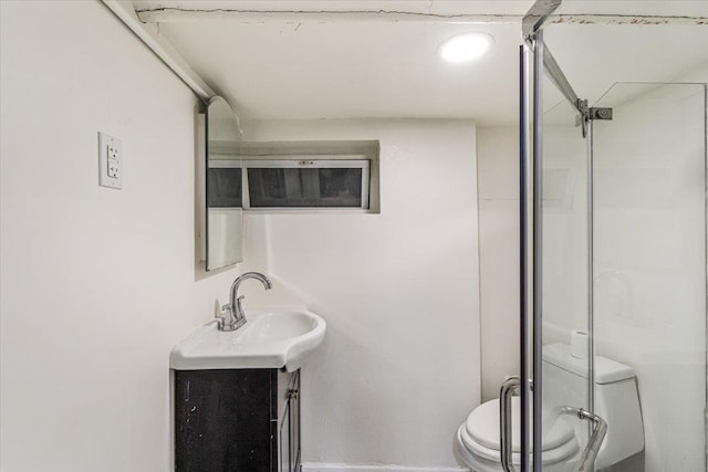 61-27 160th St, Fresh Meadows, NY 11365 - bathroom featuring a shower with door, vanity, and toilet