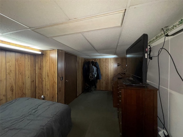 524 Polaris St, North Babylon, NY 11703 - carpeted bedroom with wood walls and a paneled ceiling