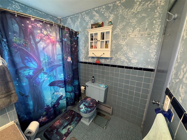 524 Polaris St, North Babylon, NY 11703 - full bathroom with wallpapered walls, wainscoting, toilet, curtained shower, and tile walls