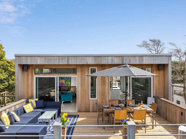 267 Floral Walk, Fire Island Pines, NY 11782 - deck featuring an outdoor living space and outdoor dining space