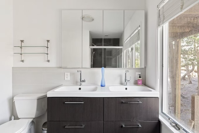 267 Floral Walk, Fire Island Pines, NY 11782 - bathroom with a wealth of natural light, a sink, and toilet