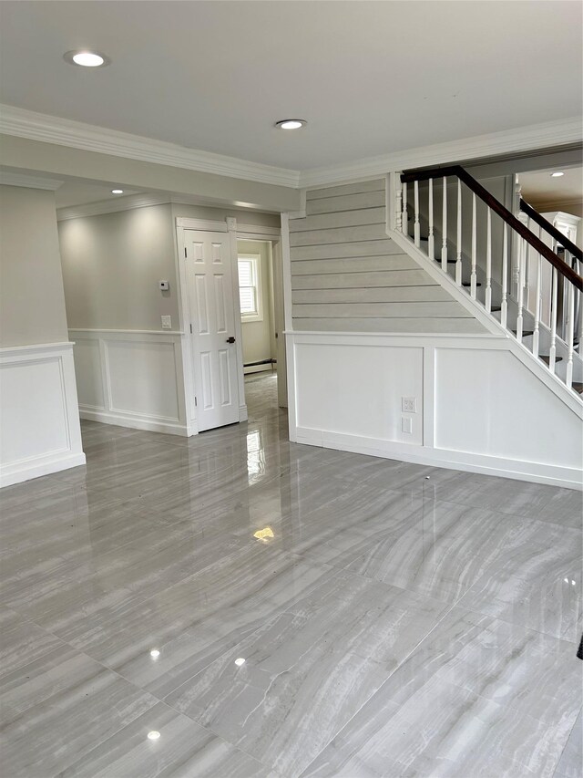 22 Peacock Ln, Levittown, NY 11756 - unfurnished living room featuring stairway, a baseboard radiator, a decorative wall, ornamental molding, and recessed lighting