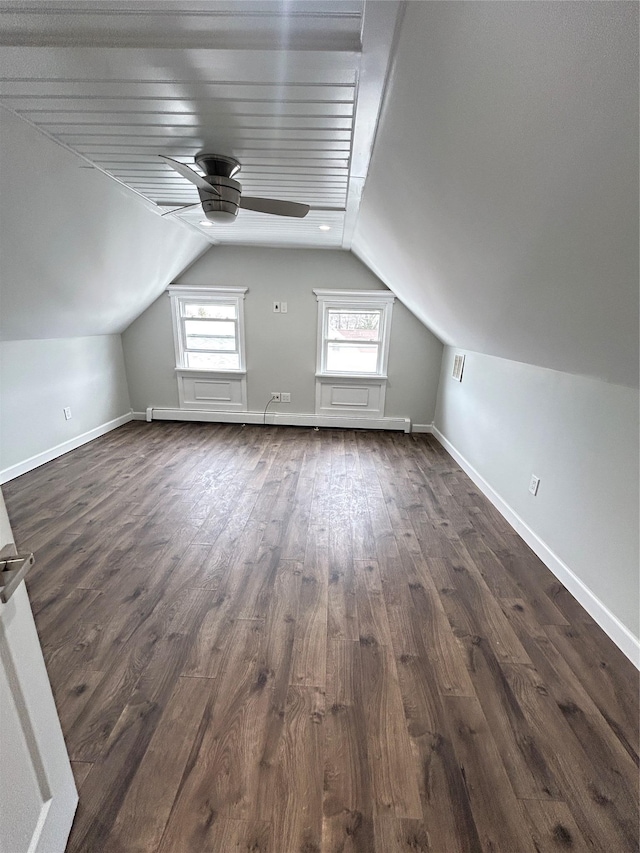 22 Peacock Ln, Levittown, NY 11756 - bonus room featuring dark wood-style floors, lofted ceiling, ceiling fan, and baseboards