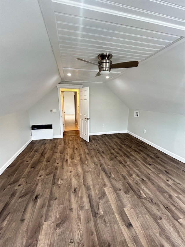 22 Peacock Ln, Levittown, NY 11756 - bonus room with baseboards, vaulted ceiling, dark wood-type flooring, and a ceiling fan