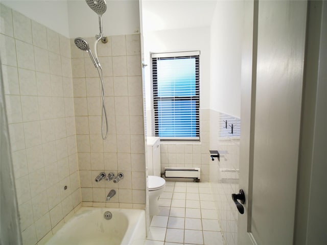 full bathroom with a baseboard heating unit, tile walls, toilet, tile patterned flooring, and shower / bathtub combination