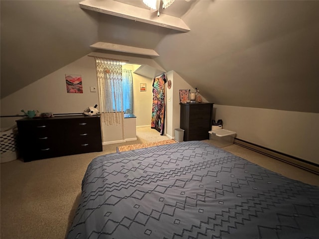carpeted bedroom featuring lofted ceiling and a baseboard radiator