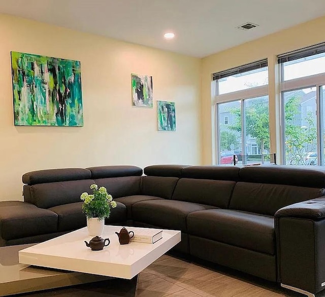 living room featuring recessed lighting
