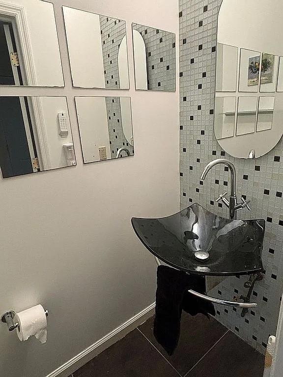 bathroom with tile patterned flooring