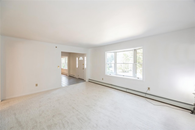 3 Benjamin Ct, Ardsley, NY 10502 - empty room featuring a baseboard radiator, carpet flooring, and baseboards