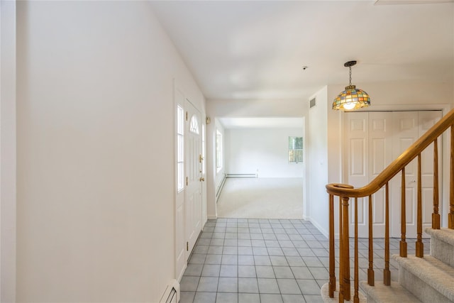 3 Benjamin Ct, Ardsley, NY 10502 - hall featuring stairs, light tile patterned floors, light colored carpet, and baseboards