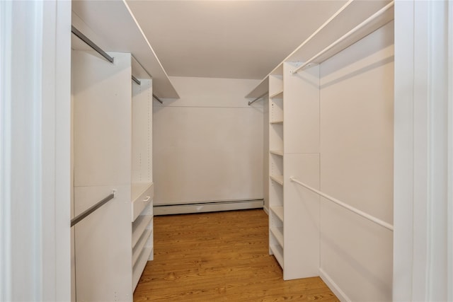 3 Benjamin Ct, Ardsley, NY 10502 - spacious closet featuring a baseboard heating unit and light wood-style floors