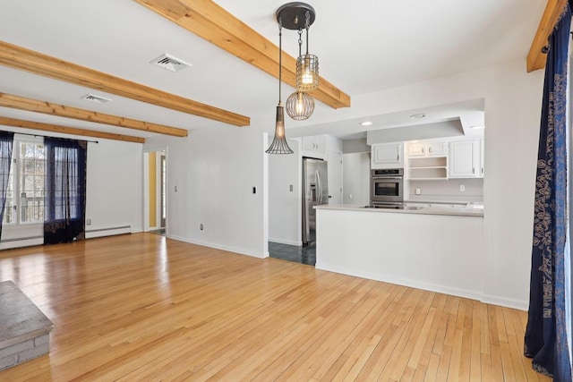 unfurnished living room with beam ceiling, light wood-style flooring, and visible vents