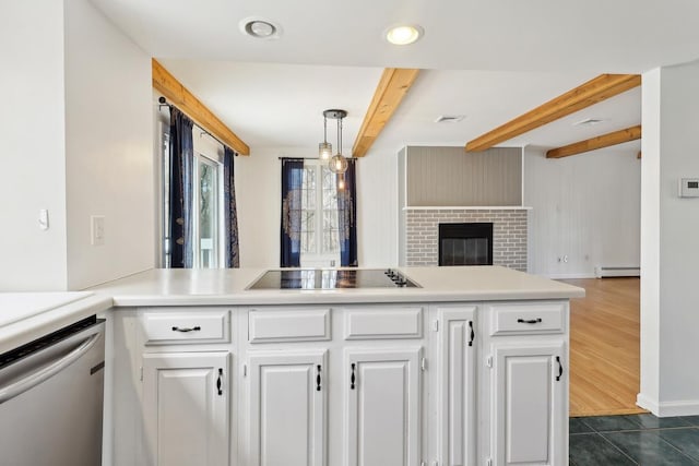 kitchen with stainless steel dishwasher, beam ceiling, black electric stovetop, open floor plan, and white cabinetry