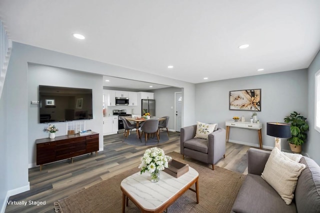 81 New Ave, Wyandanch, NY 11798 - living room with baseboards, wood finished floors, and recessed lighting