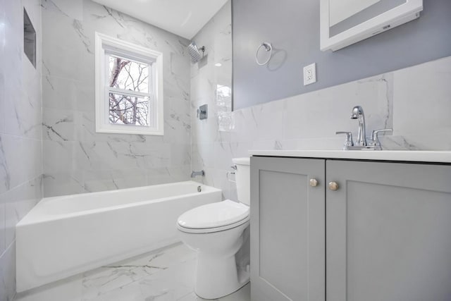 81 New Ave, Wyandanch, NY 11798 - full bathroom featuring vanity, tile walls, toilet, bathing tub / shower combination, and marble finish floor