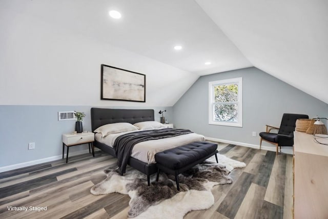 81 New Ave, Wyandanch, NY 11798 - bedroom with recessed lighting, baseboards, vaulted ceiling, and wood finished floors