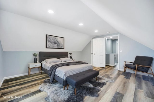 81 New Ave, Wyandanch, NY 11798 - bedroom featuring baseboards, lofted ceiling, wood finished floors, and recessed lighting