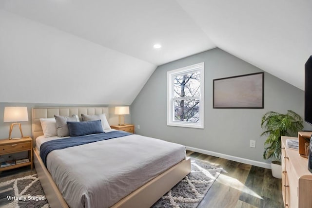 81 New Ave, Wyandanch, NY 11798 - bedroom featuring baseboards, lofted ceiling, and wood finished floors