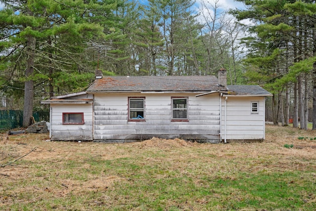 34 Hunczak Blvd, Glen Spey, NY 12737 - view of home's exterior featuring a yard and a chimney