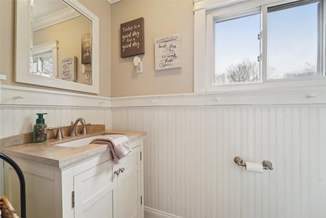 160 Mill St, Wallkill, NY 12589 - bathroom with a wainscoted wall, vanity, and crown molding
