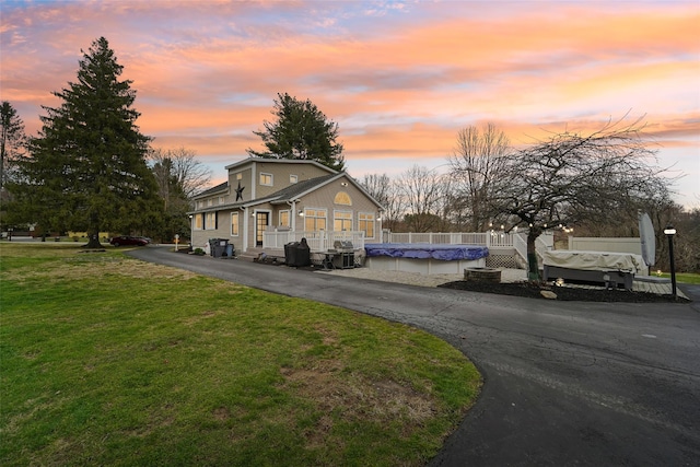 160 Mill St, Wallkill, NY 12589 - view of front facade featuring a front lawn