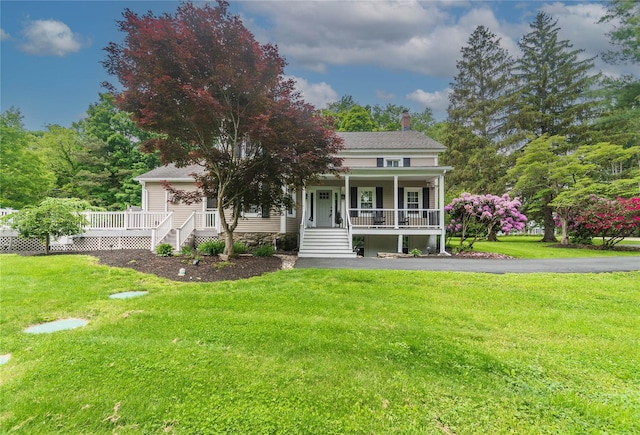 160 Mill St, Wallkill, NY 12589 - view of front facade featuring a porch, a chimney, a front lawn, and stairway