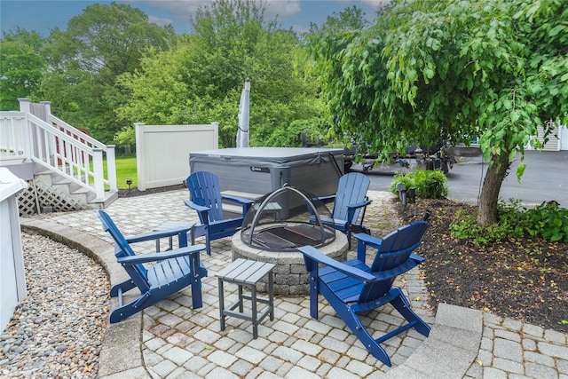 160 Mill St, Wallkill, NY 12589 - view of patio / terrace featuring a hot tub and an outdoor fire pit