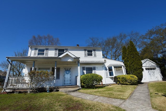 48 Drake Ln, Levittown, NY 11756 - view of front of house featuring a porch and a front yard