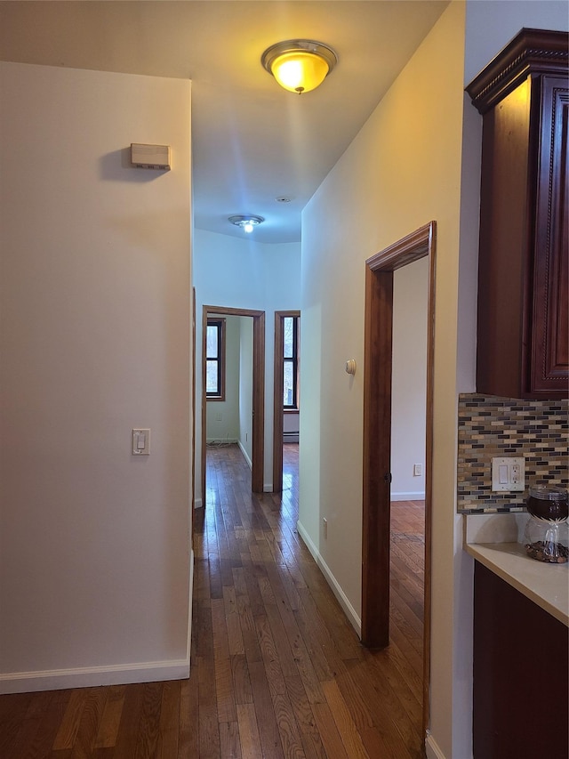 1871 Prospect Pl, Brooklyn, NY 11233 - corridor featuring dark wood-type flooring and baseboards