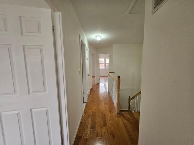 1871 Prospect Pl, Brooklyn, NY 11233 - hallway with an upstairs landing, baseboards, and wood finished floors