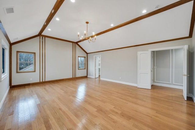 23 Grouse Ln, Levittown, NY 11756 - interior space with light wood-style flooring, baseboards, visible vents, a notable chandelier, and lofted ceiling