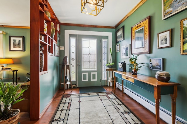 doorway featuring baseboards, a chandelier, crown molding, wood finished floors, and a baseboard heating unit