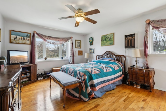 bedroom featuring ceiling fan and light wood finished floors