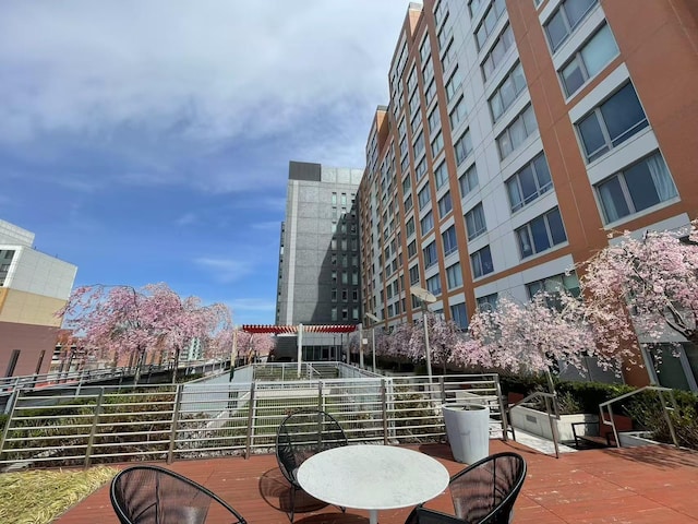 13835 39th Ave Unit 17M, Flushing, NY 11354 - view of patio featuring a balcony