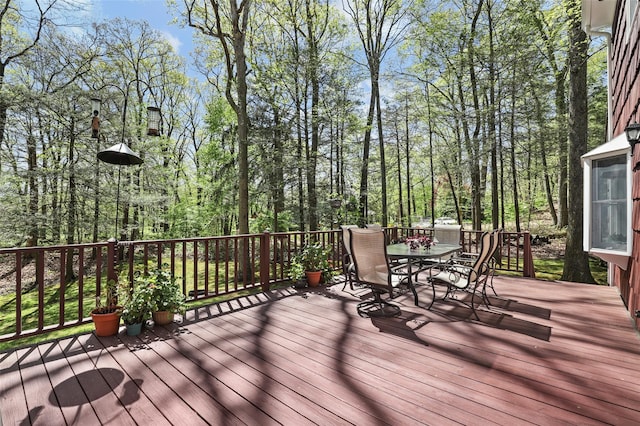 deck featuring outdoor dining space