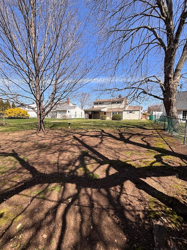 view of yard with fence
