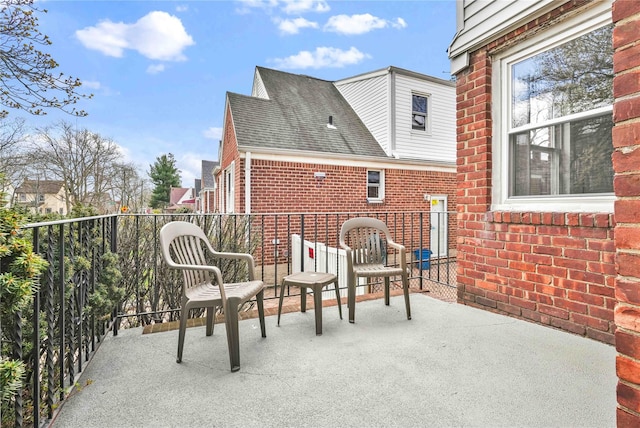view of patio with a balcony