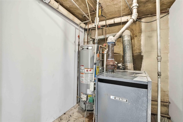 utility room with gas water heater