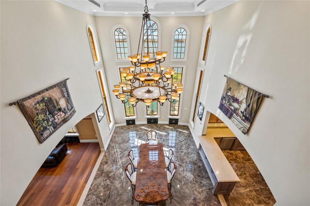 117 Malba Dr, Malba, NY 11357 - entrance foyer featuring a chandelier, a towering ceiling, baseboards, and ornamental molding