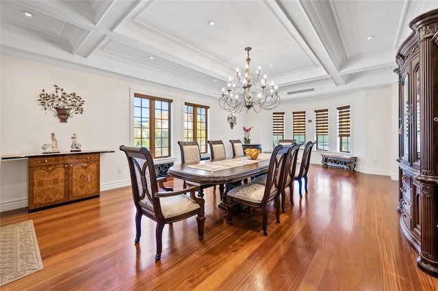 117 Malba Dr, Malba, NY 11357 - dining area featuring beam ceiling, a notable chandelier, coffered ceiling, wood finished floors, and ornamental molding