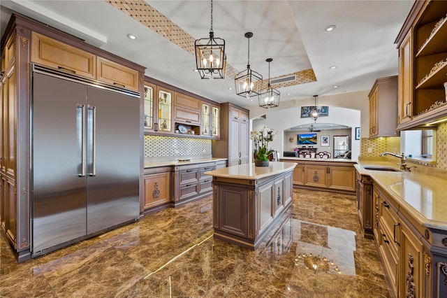 117 Malba Dr, Malba, NY 11357 - kitchen with recessed lighting, tasteful backsplash, stainless steel built in fridge, and a sink