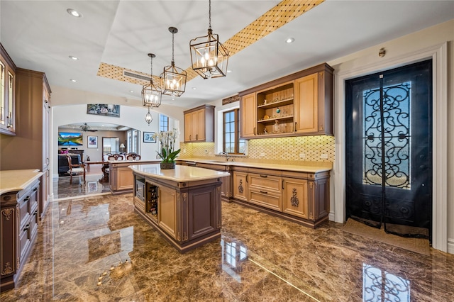 117 Malba Dr, Malba, NY 11357 - kitchen with a sink, tasteful backsplash, recessed lighting, open shelves, and light countertops