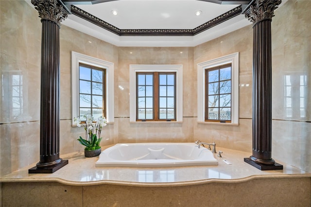 117 Malba Dr, Malba, NY 11357 - bathroom with recessed lighting, a bath, a healthy amount of sunlight, and decorative columns
