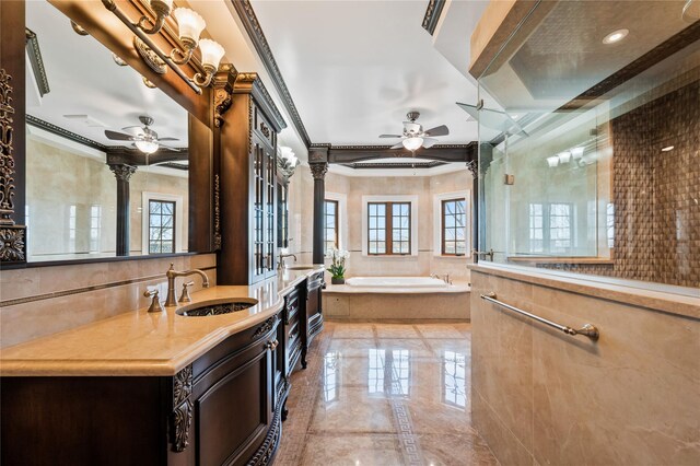 117 Malba Dr, Malba, NY 11357 - full bath with a garden tub, a ceiling fan, crown molding, and decorative columns