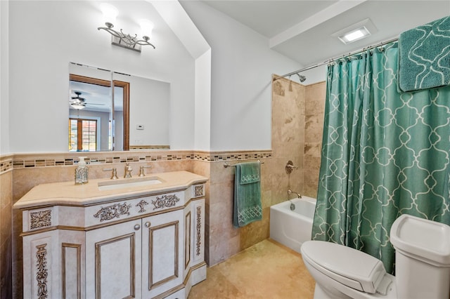 117 Malba Dr, Malba, NY 11357 - full bath featuring tile walls, wainscoting, shower / tub combo with curtain, and toilet