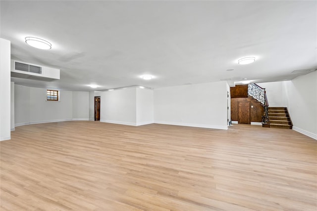 117 Malba Dr, Malba, NY 11357 - basement featuring baseboards, visible vents, light wood-style floors, and stairway