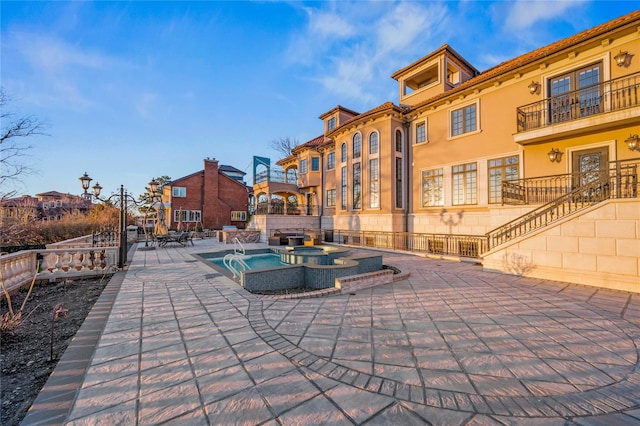 117 Malba Dr, Malba, NY 11357 - exterior space featuring stairway, a patio, a swimming pool, and a jacuzzi